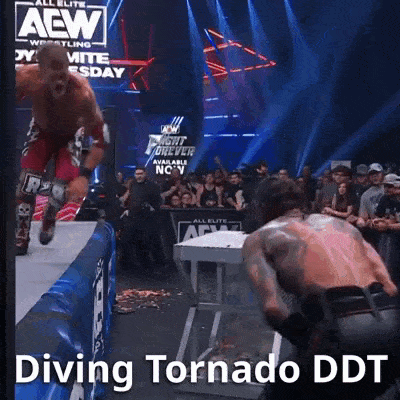 a wrestler is jumping over another wrestler on a stage with the words diving tornado ddt written on the bottom