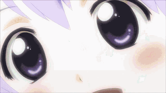 a close up of a girl 's face with purple eyes and a pink tongue sticking out