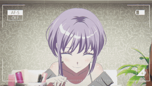 a girl with purple hair is smiling in front of a camera that has af-s off