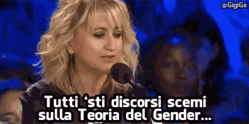 a woman is speaking into a microphone and says tutti 'sti discorsi scemi sulla teoria del gender ...