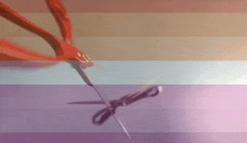 a pair of scissors is cutting a piece of paper with a needle in it .