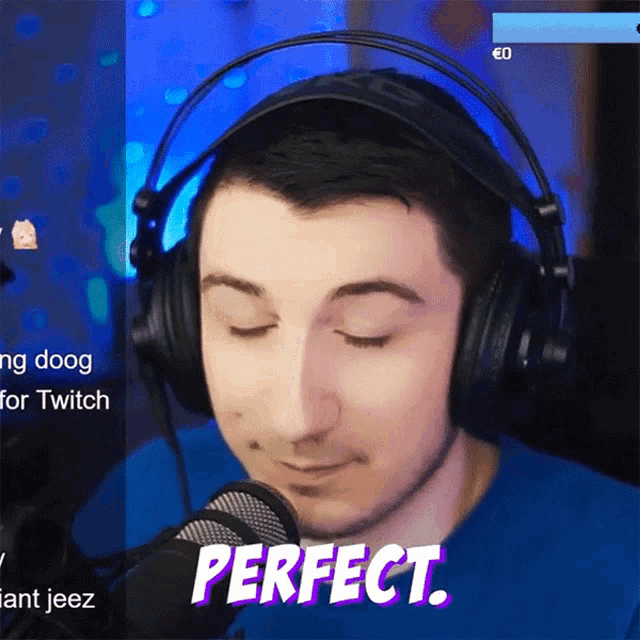 a man wearing headphones and a blue shirt says perfect in purple letters