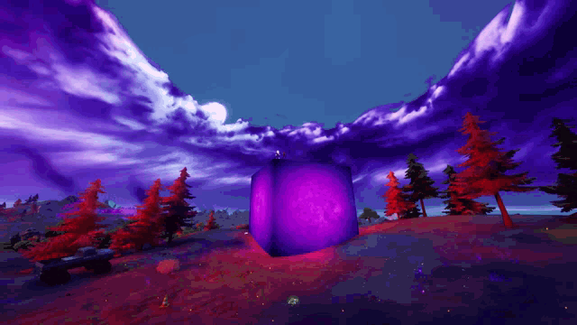 a purple cube is in the middle of a field