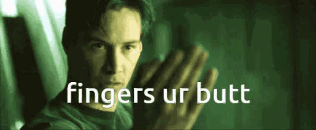 a man in a green shirt with the words fingers ur butt on the bottom