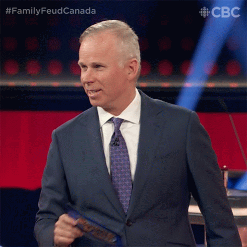 Here I Am Family Feud Canada GIF - Here I Am Family Feud Canada Smirk GIFs