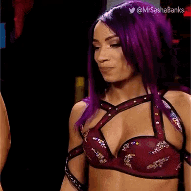 a woman with purple hair is wearing a bra and saying `` you 're right . ''
