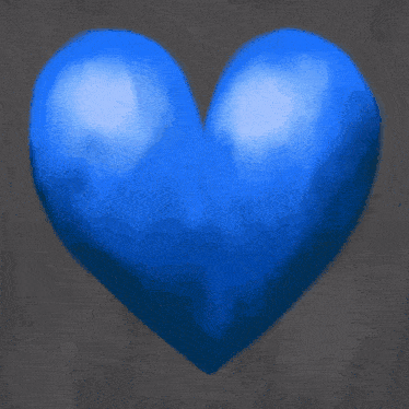 pink and blue balloons in the shape of a heart on a grey background
