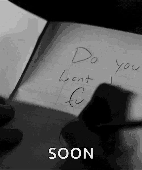 someone is writing on a piece of paper that says do you want