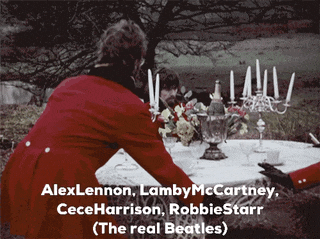 a man in a red jacket is sitting at a table with candles