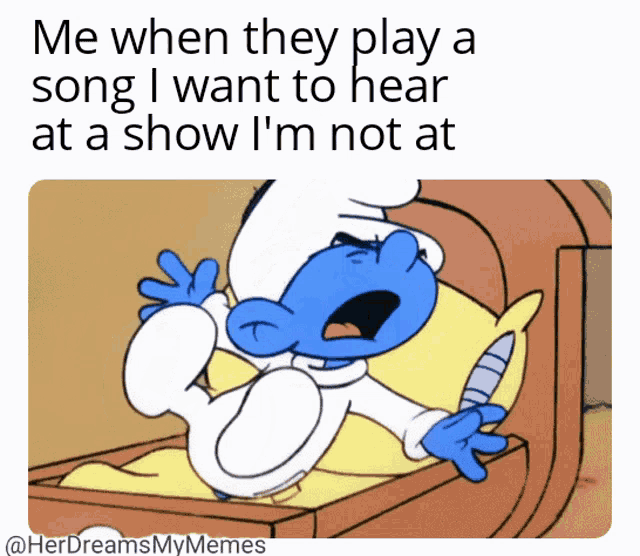 a smurf laying in bed with a knife in his hand and a caption that says me when they