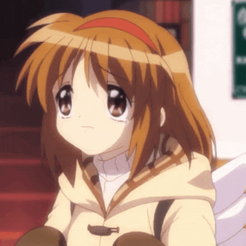 a girl with brown hair and a red headband looks sad