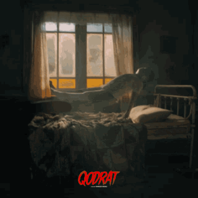 a poster for godrat shows a person laying on a bed in front of a window