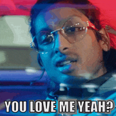 a woman wearing glasses and a choker says " you love me yeah "