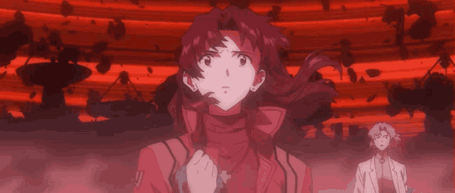 a woman in a red jacket stands in front of a red background