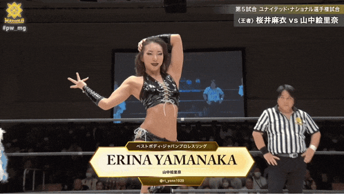 a female wrestler named erina yamanaka stands in a wrestling ring