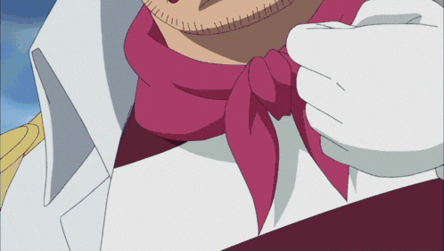 a man wearing a white shirt and a red scarf