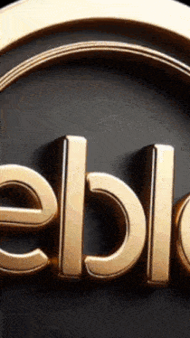 a close up of a gold emblem that says eble