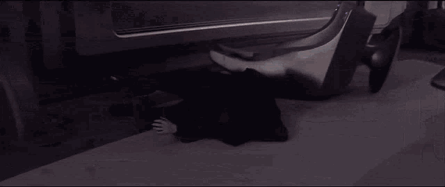 a blurred image of a room with a person flying through the air