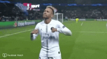 a soccer player wearing a fly emirates jersey is running on the field .