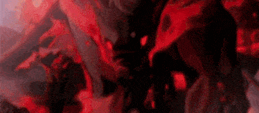 a close up of a person 's face with a red background