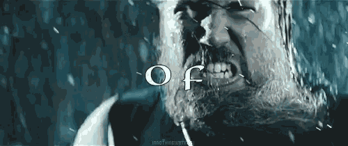 a man with a beard is screaming in the rain with the word of written above him
