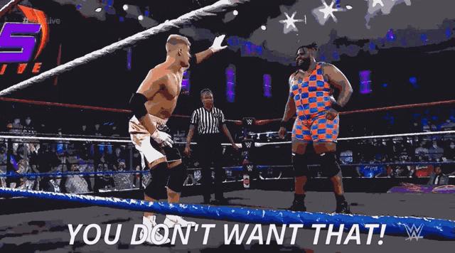 two wrestlers in a ring with the words " you don 't want that "