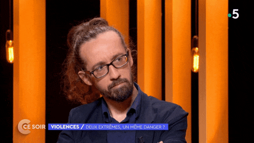 a man with glasses and a ponytail is on a television show called ce soir