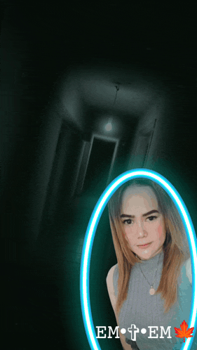 a picture of a woman in a circle with the word em on the bottom