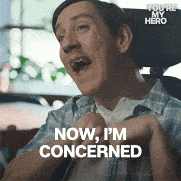 a man in a wheelchair with the words now i 'm concerned above him