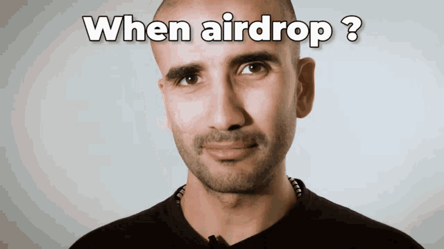 a man with a beard is asking the question " when airdrop ? "