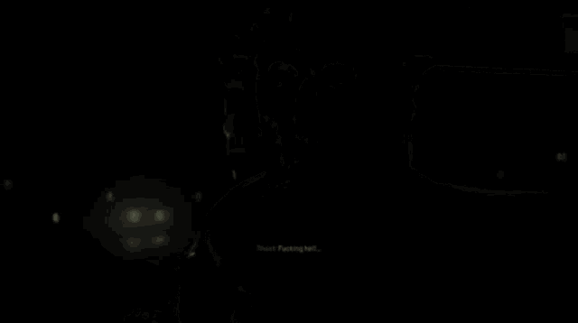 a man in a skull mask is sitting in the back seat of a car .