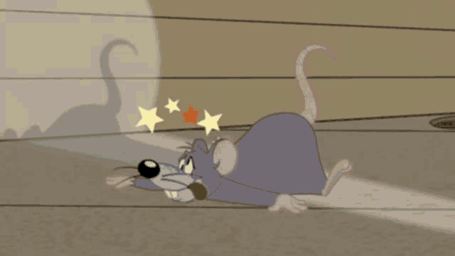 a cartoon rat with stars on its head is running