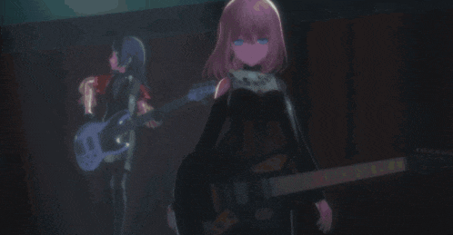 a girl with pink hair is holding a guitar in front of another girl