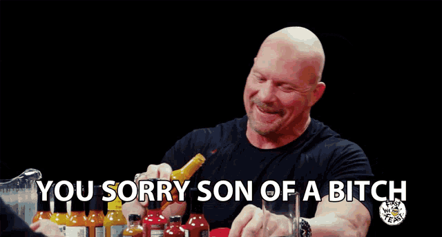 a man holding a bottle of hot sauce with the words you sorry son of a bitch behind him