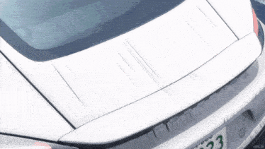 a white car with a license plate that says 023