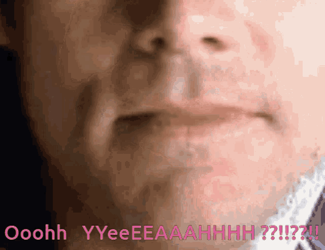 a close up of a man 's face with the words ooohh yyeeeeaahhhh written in pink