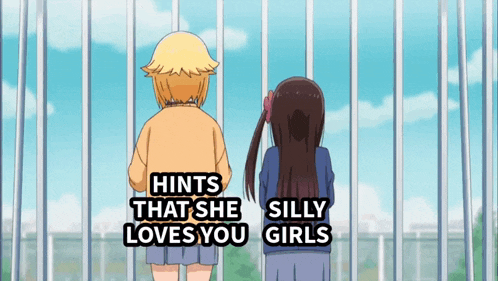 two girls standing next to each other with hints that she loves you