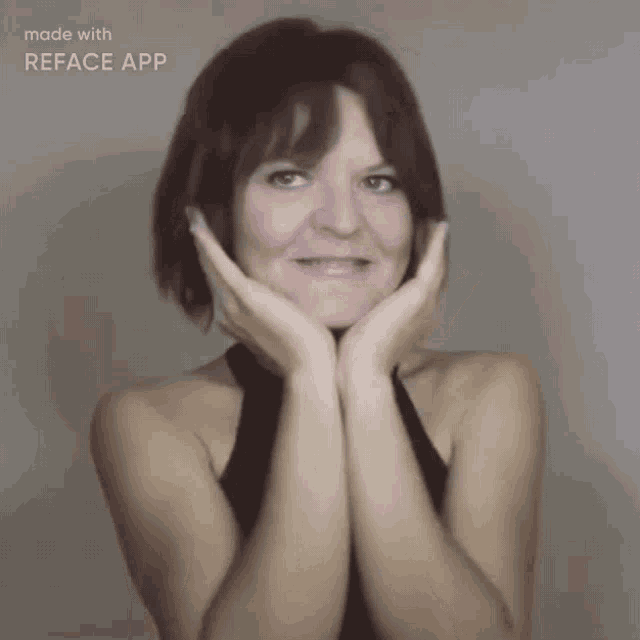 a woman with her hands on her face and the words made with reface app above her