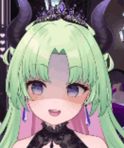 a close up of a girl with green hair and horns wearing a tiara .