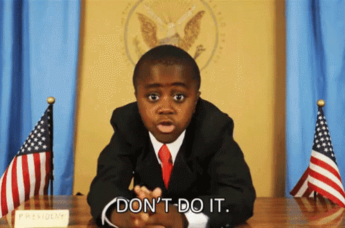 a young boy in a suit and tie says " do n't do it " in front of the president 's desk