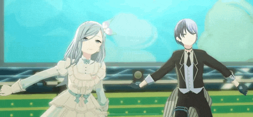 a girl in a white dress and a boy in a tuxedo are dancing together on a stage .
