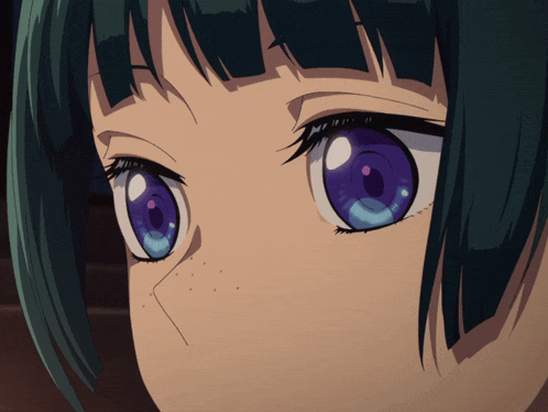 a close up of a girl 's face with purple eyes and green hair