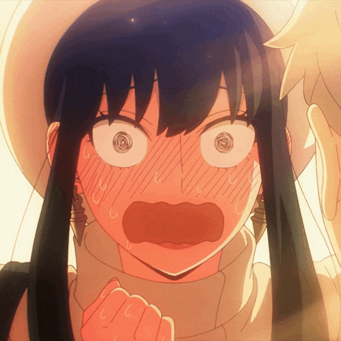 a close up of a girl 's face with a surprised look on her face