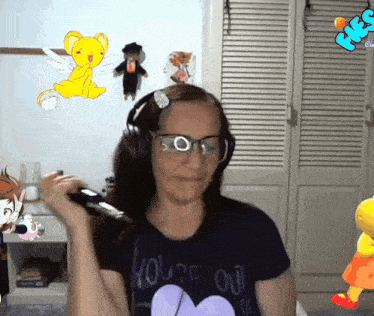 a woman wearing headphones and a shirt that says you 're out on it