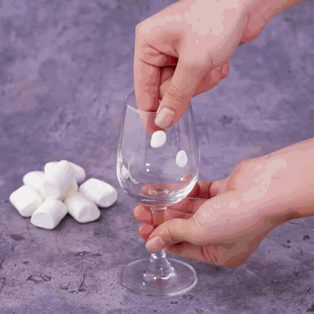 a bowl of whipping cream is sitting on a stove