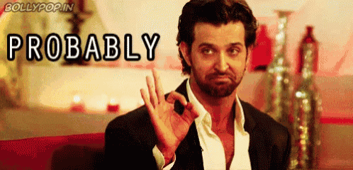 a man in a suit is giving an ok sign and the word probably is above him