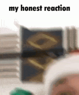a blurred image of a person 's face with the words " my honest reaction " on the bottom