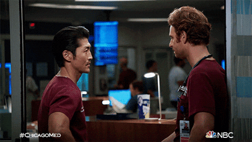 two doctors are standing next to each other in a hospital room with nbc written on the bottom