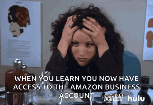 a woman is sitting at a desk with her hands on her head and a caption that says when you learn you now