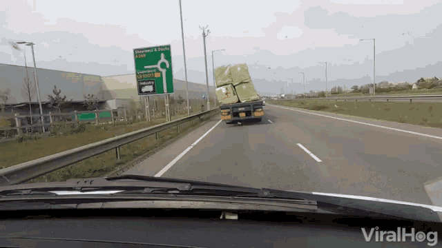 Precarious Load Leaning Cargo Truck GIF - Precarious Load Leaning Cargo Truck Dangerous GIFs